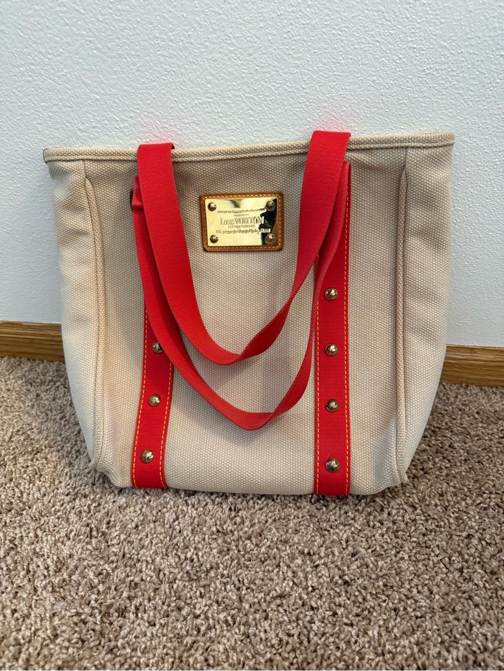 Louis Vuitton Beige Canvas Tote with Red Straps and Gold Plate